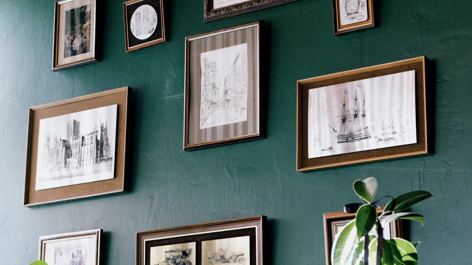 A wall of framed art and prints in a home, the kind of collection that needs scheduled coverage